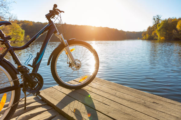 bike on the river with a bag on the trunk