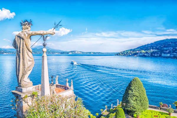 Beautiful Isola Bella island with flower garden and sculptures on Lake Lago Maggiore, Stresa, Italy