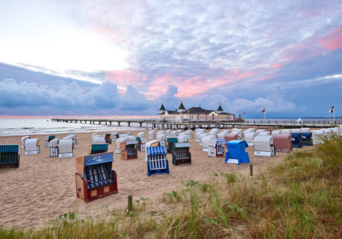 morning time at baltic sea beach and sight Ahlbeck pier in sunrise.